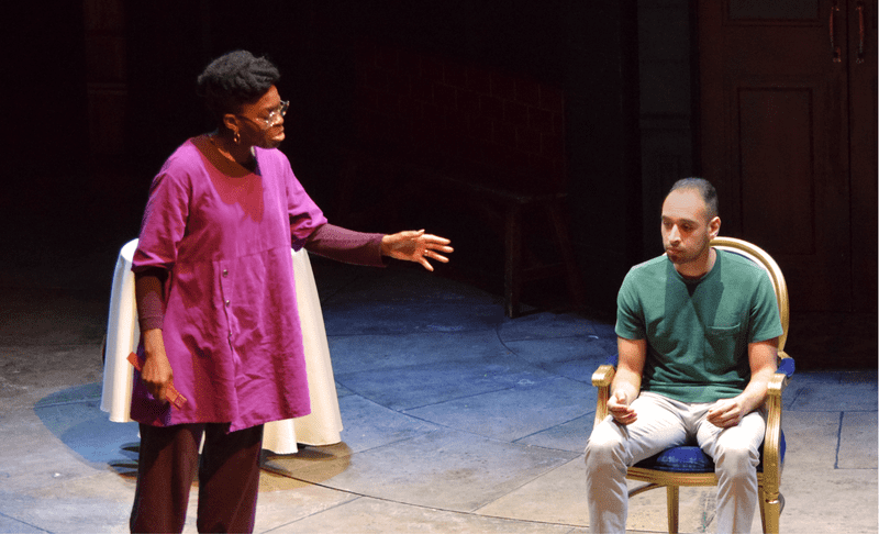 Rakie Ayola workshopping a scene on stage with a Masterclass member