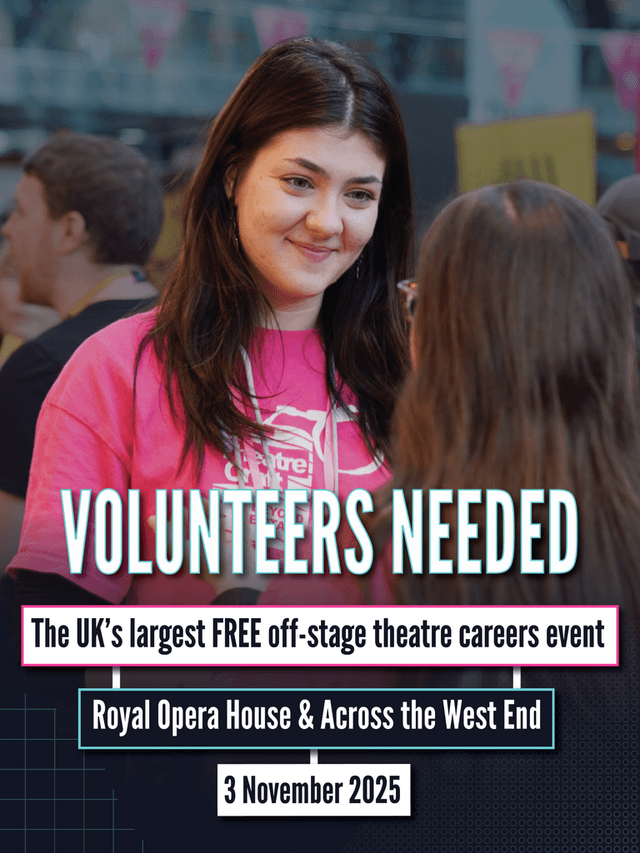 A smiley young woman in a bright pink TheatreCraft t-shirt faces another young person with their back to the camera.