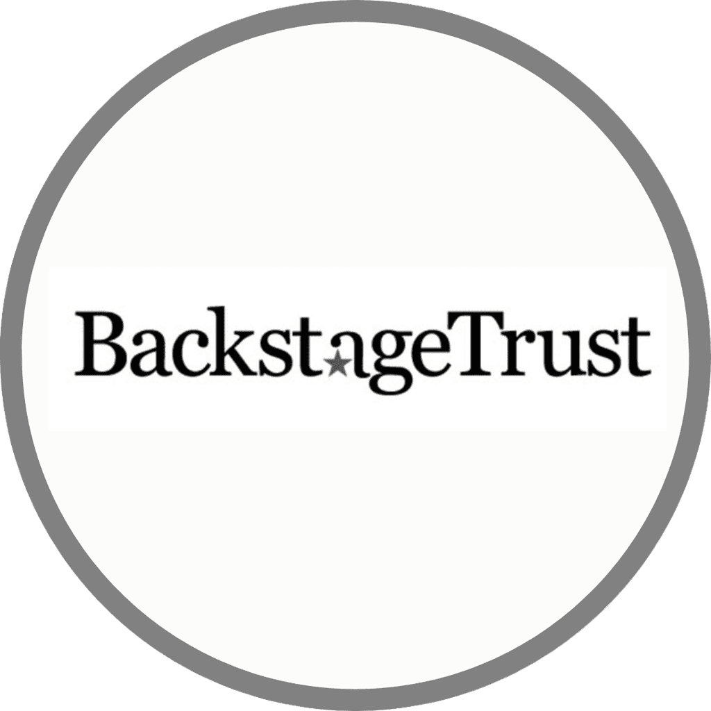 The logo of "Backstage Trust," featuring the name in a classic serif font, with a small star incorporated in place of the letter "a" in the word "Backstage."
