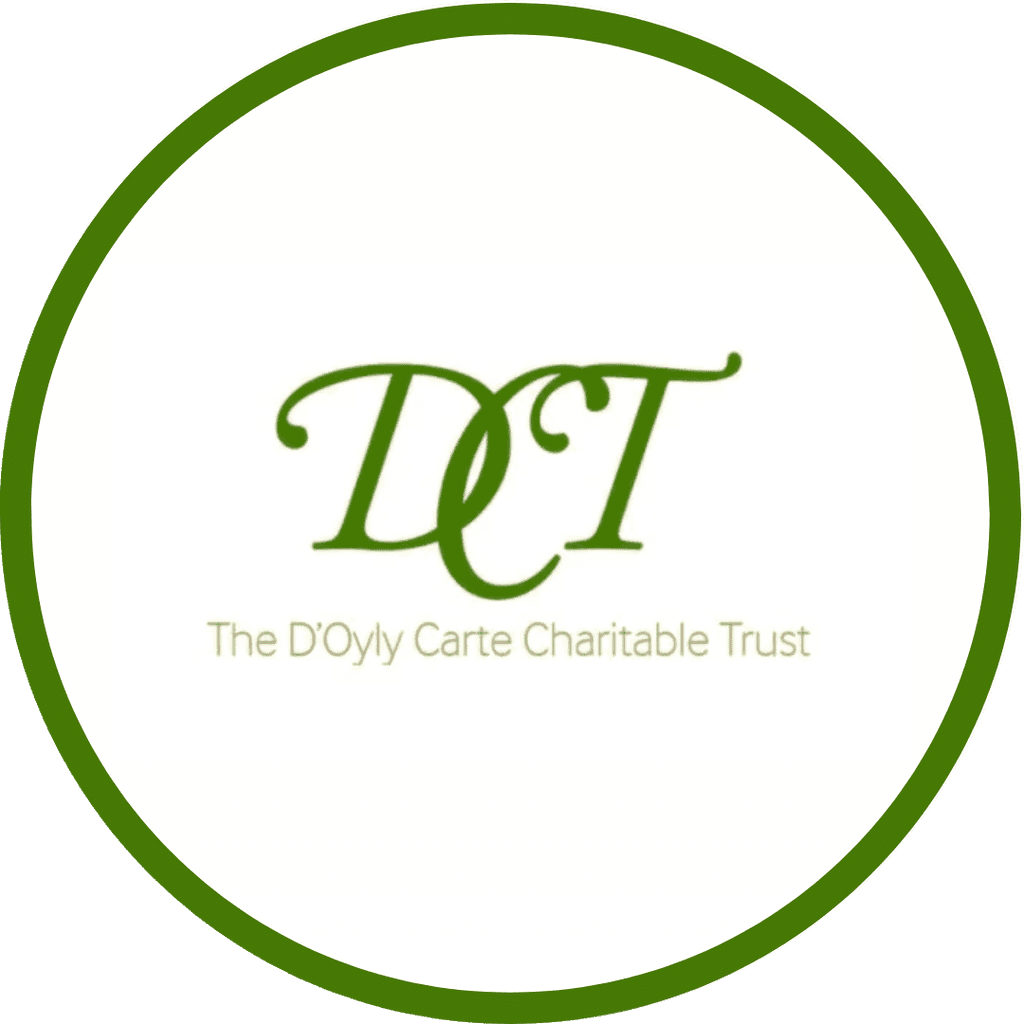 The logo for the Doly Care Charitable Trust featuring their green emblem and a green circle surrounding the emblem and charity name.