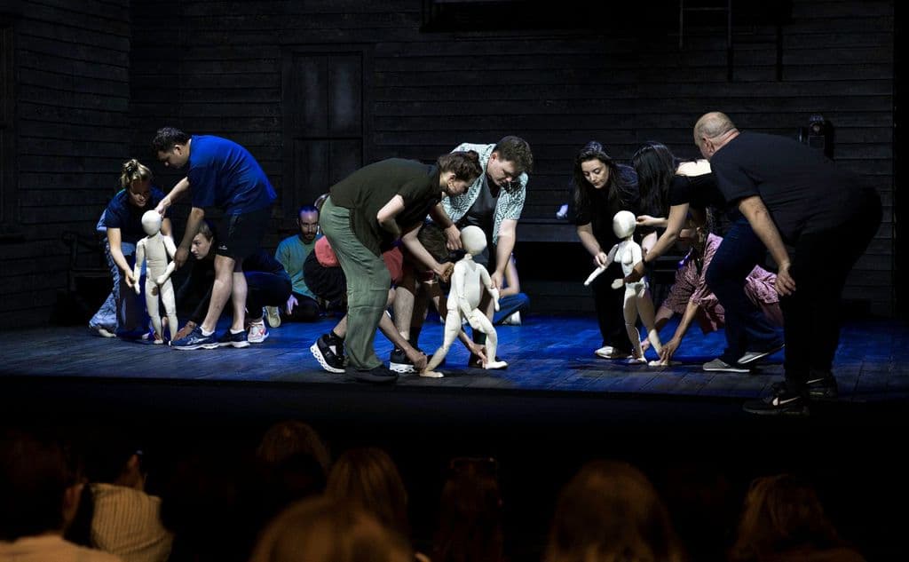 Masterclass members learning how to operate puppets from puppetry legend, Finn Caldwell