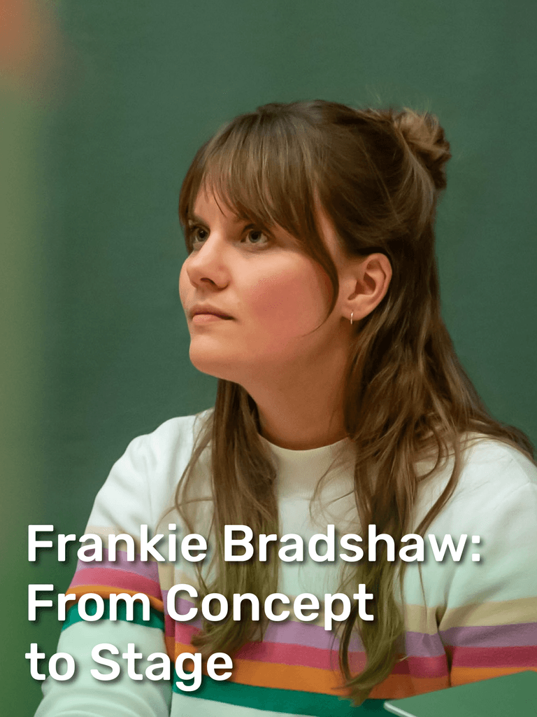 Frankei Brandshaw, a female with long hair and a colorful striped sweater seated, engaged in a discussion against a green backdrop.