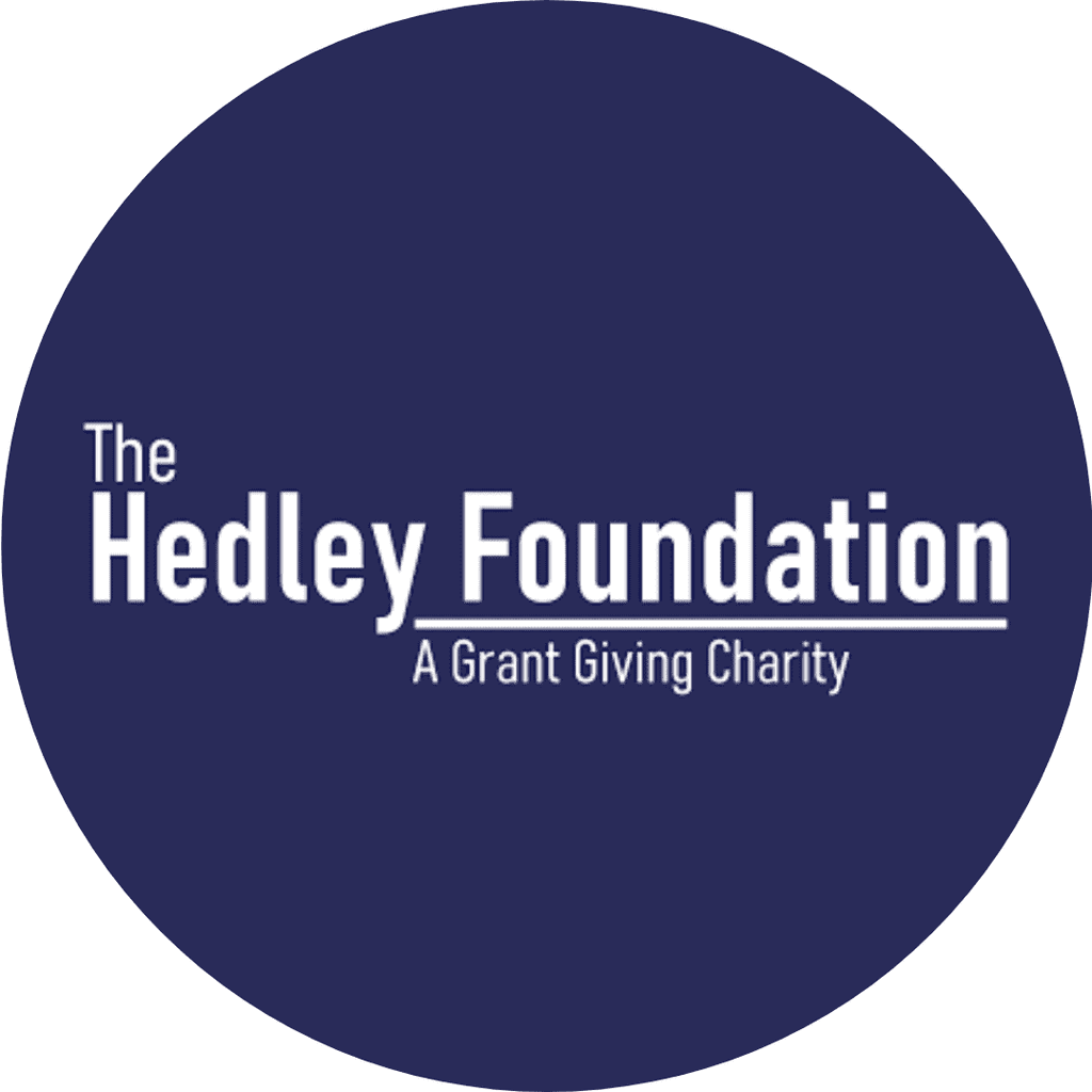 Logo of the Healey Foundation. The name of the charity is written in white in the centre of a blue background. Foundation is underlined and beneath reads "A grant giving charity".
