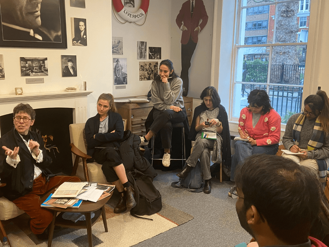 A room of Masterclass members with Marcy Kahan, at the Noel Coward Foundation.
