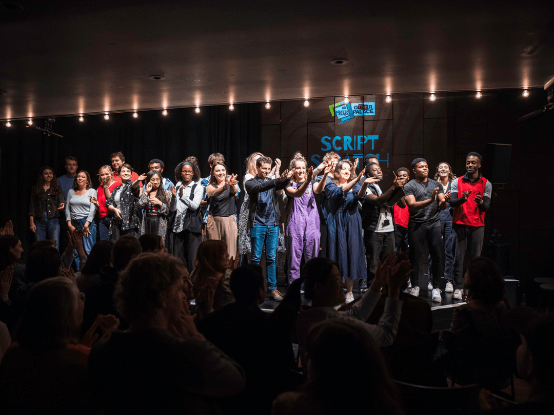 Script Social August 2024 group of creatives bowing at the end of the event, all lined up on stage clapping towards the technical engingeer.