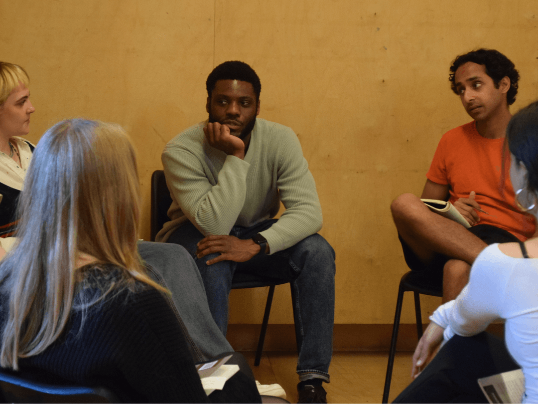 A small break out group of Masterclass members discussing Machinal by Sophie Treadwell