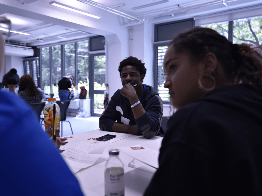 A young person from Avenues Youth group listening to a director in a Start Your Script workshop