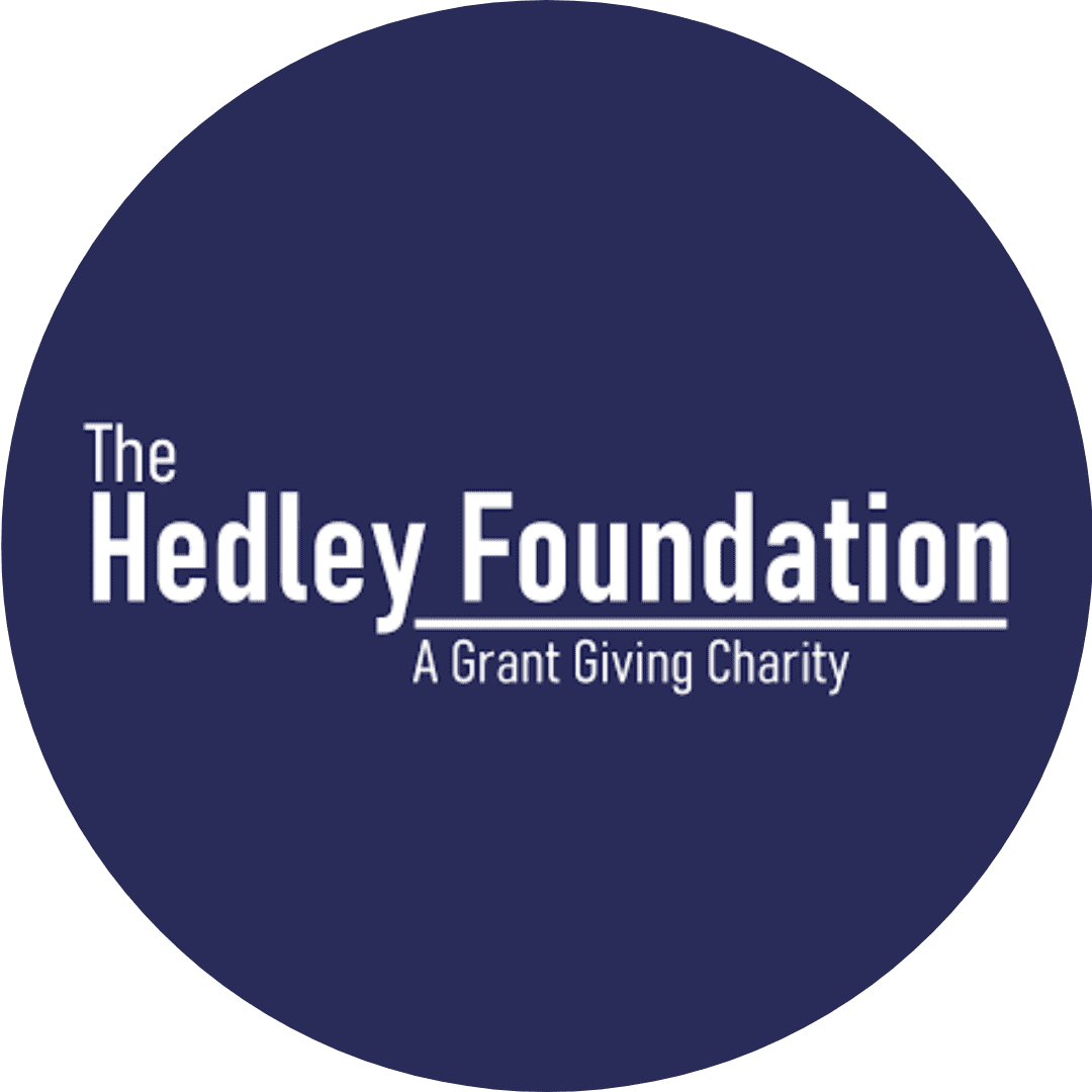 Logo of the Healey Foundation. The name of the charity is written in white in the centre of a blue background. Foundation is underlined and beneath reads "A grant giving charity".