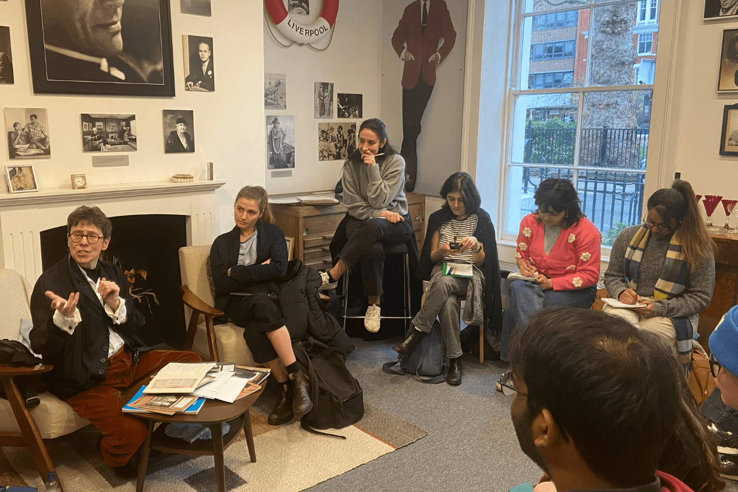 A room of Masterclass members with Marcy Kahan, at the Noel Coward Foundation.