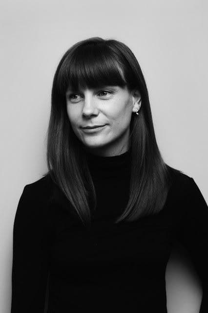 Headshot of Rebecca Frecknall in Black & White